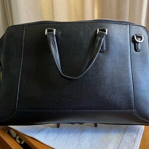 Knomo laptop bag - black. No strap.